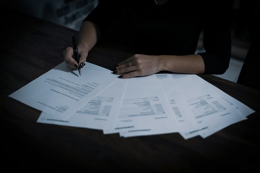 Person signing multiple contracts