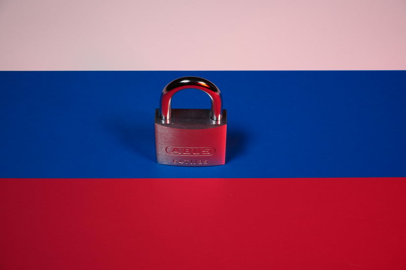 A Russian flag with a padlock on it