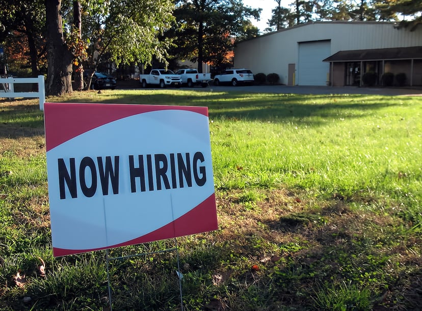 Sign saying 'now hiring'