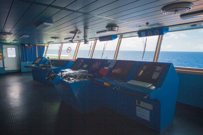 navigational controls on a ship's bridge