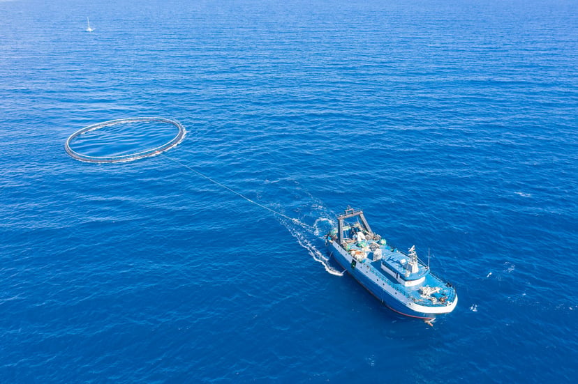 Drone view of a fishing trawler at sea