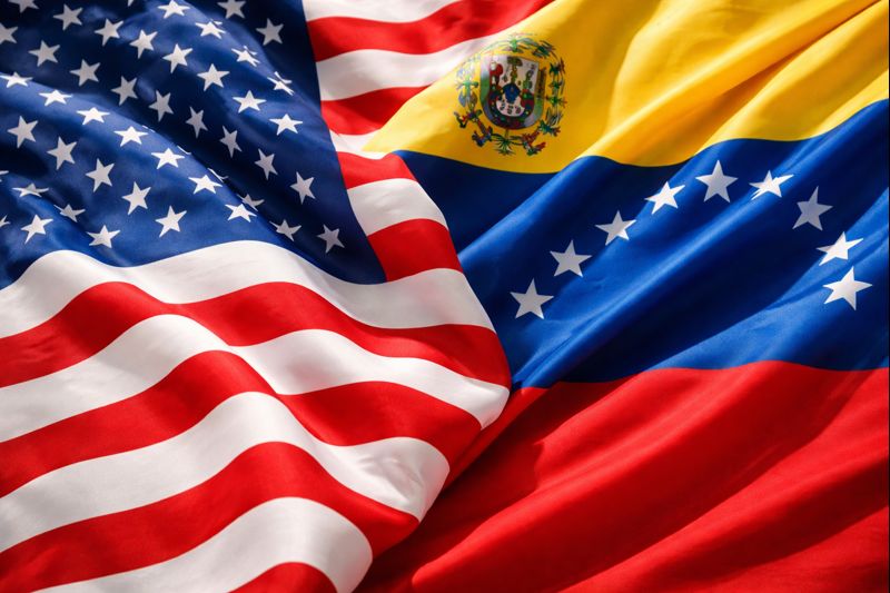 The USA and Venezuelan flags intertwined