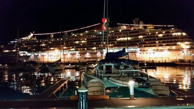 The Carnival Legend cruise ship in port at night