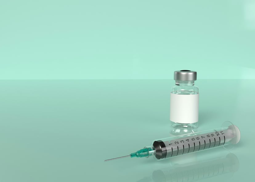 A vial of drugs and a syringe