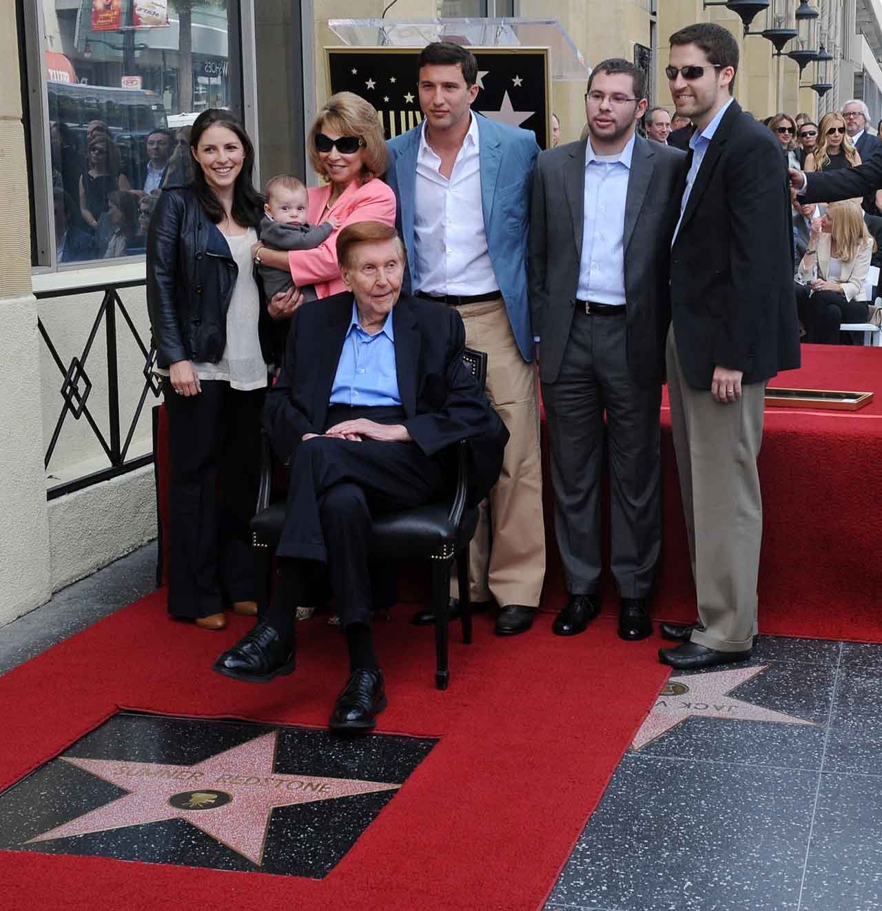 Sumner Redstone surrounded by family members