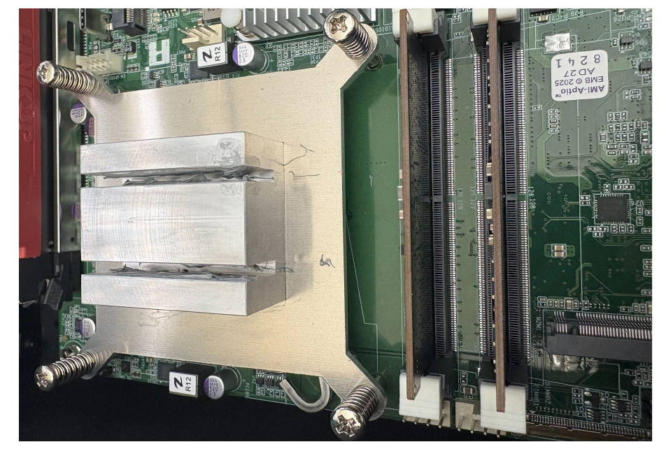 CPU riser block showing the thermal paste application channels