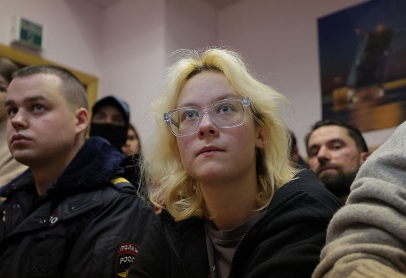Image for Russian street musician found guilty of 'discrediting' the army after she played anti-Kremlin songs