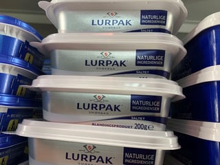 Image for Lurpak-maker Arla forecasts drop in dairy prices after supply surge in Europe