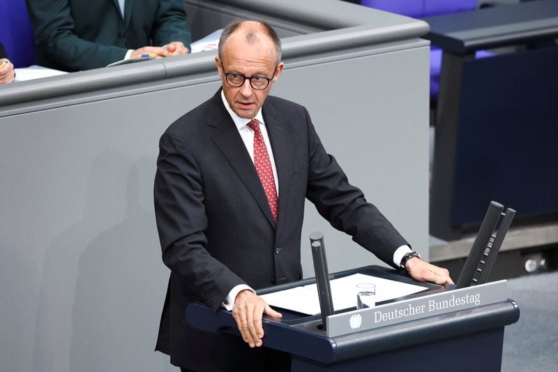 Image for Germany's Merz accuses Putin of murder and trying to destabilise West