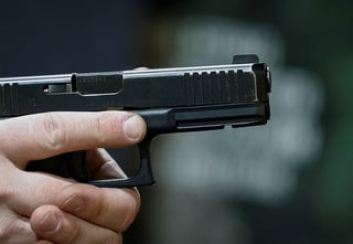 Image for Analysis-Mass shooting reignites push to loosen gun laws in war-torn Ukraine