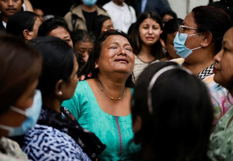 Image for Nepal festivities ring hollow for families mourning dead protesters