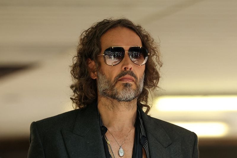 Image for Russell Brand appears in UK court by video link on further rape, sex assault charges