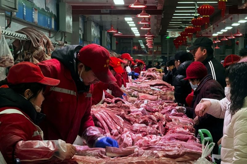 Image for China delays decision on EU pork imports as EV tariff talks continue