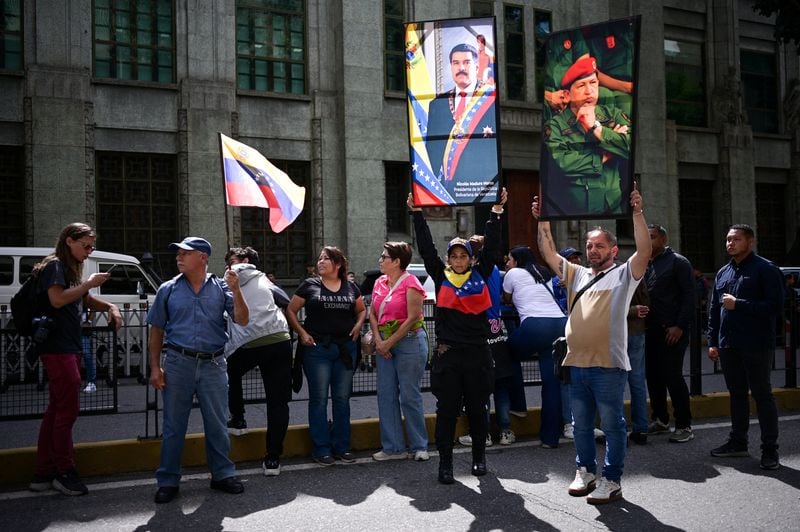 Image for Restoring democracy in Venezuela must respect its people's will, EU countries say