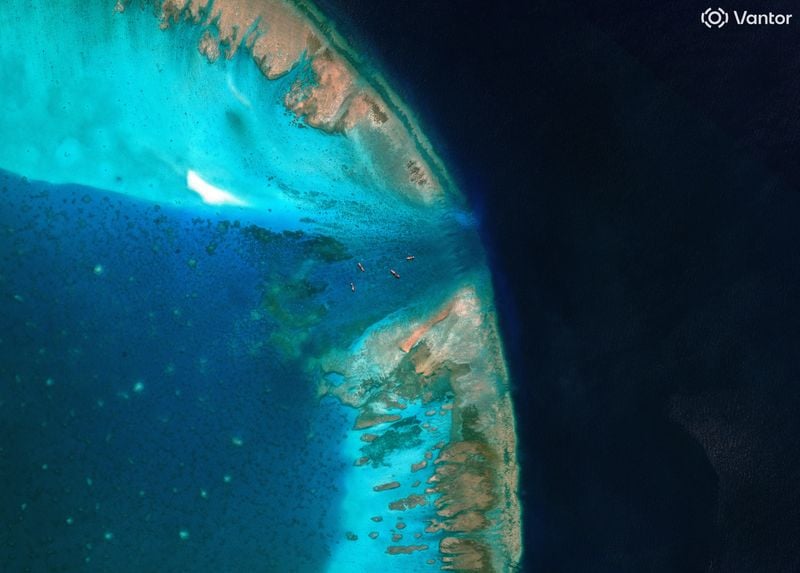 Image for Exclusive-China moves to block entrance to disputed South China Sea shoal, images show