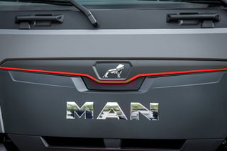 Truck maker MAN announces investment and cuts in deal to save jobs