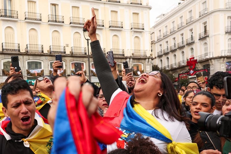 Image for Venezuelan opposition activists in Madrid warily cheer Maduro capture