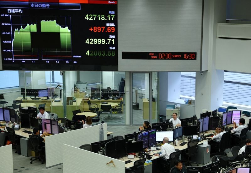 Image for World equities hit record highs, US yields fall on optimism for Fed rate cut