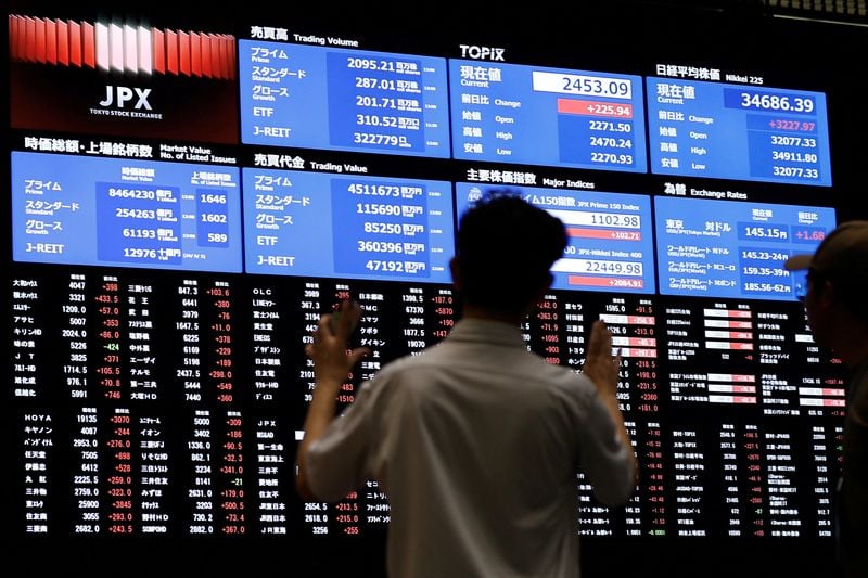 Image for Nikkei ends lower on yen strength, profit-taking after crossing 44,000