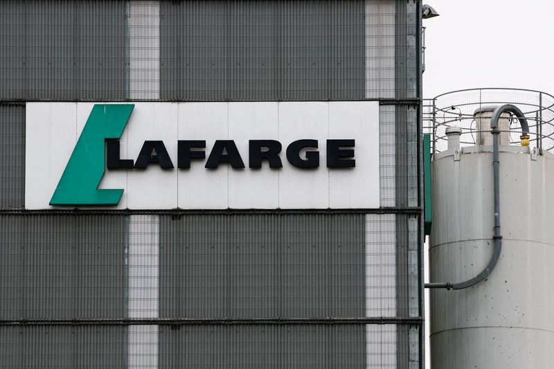 Image for French cement maker Lafarge faces trial on charges of financing jihadists in Syria