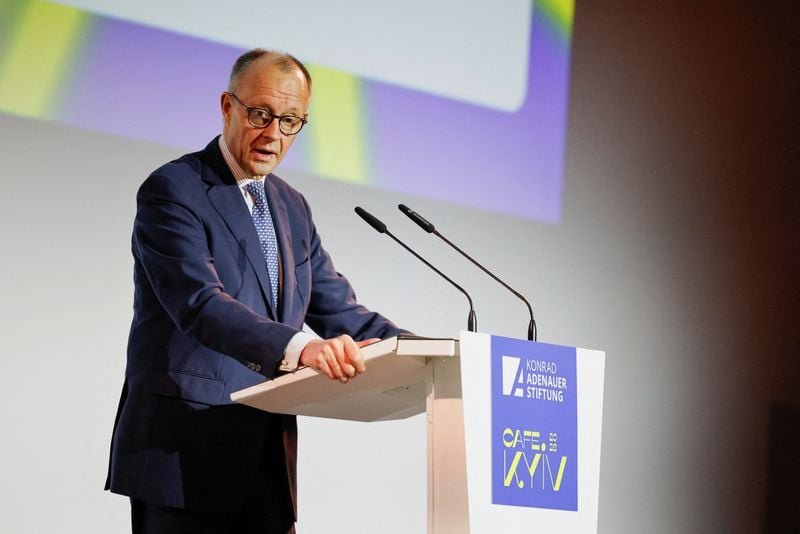 Image for Germany's Merz: disqualified Olympian's helmet symbolizes Ukraine's courage