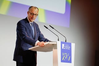 Image for Germany's Merz: disqualified Olympian's helmet symbolizes Ukraine's courage