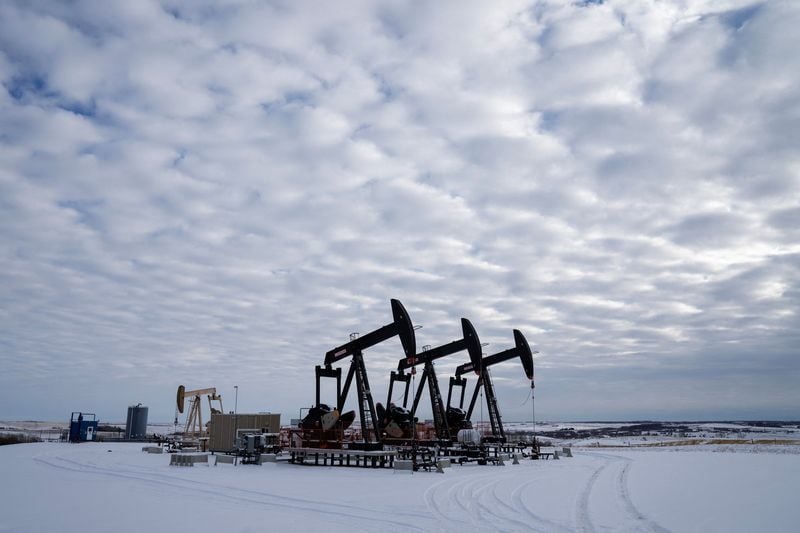 Image for Oil prices hover around four-month high, buoyed by Iran concerns, weak dollar