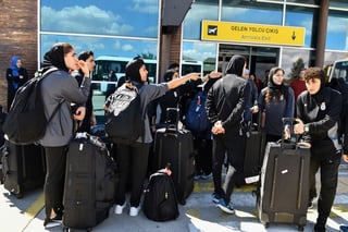 Image for Iranian women's soccer team arrive back in Iran after some withdrew asylum claim