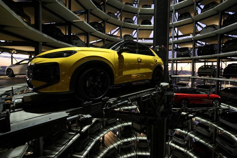 Image for VW shares jump to top of Germany's DAX after it reports upbeat automotive cash flow