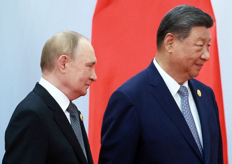 Image for China's Xi hosts 'old friend' Putin, North Korea's Kim in challenge to West