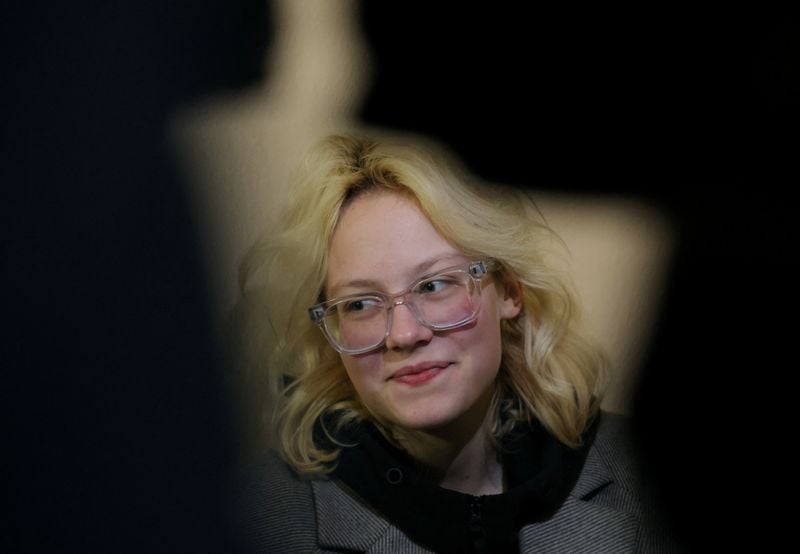 Image for Teenage Russian street musician jailed over anti-Kremlin songs is detained as she leaves jail
