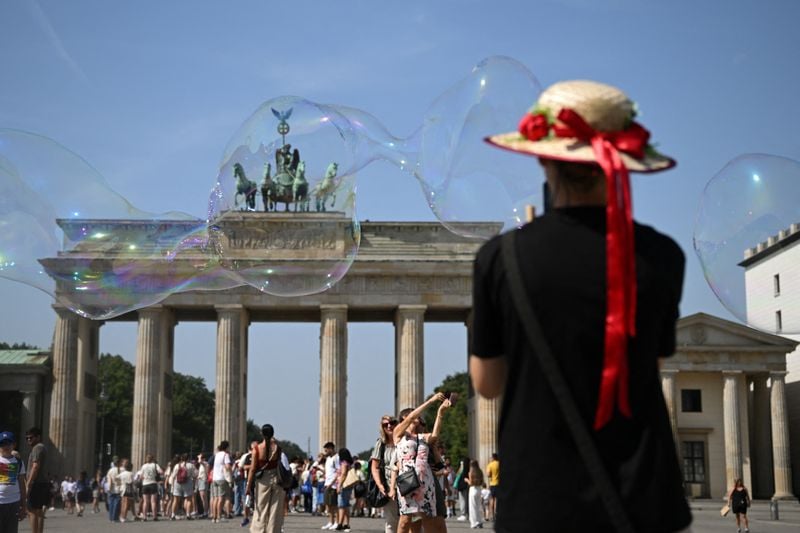 Image for Berlin courts tourists as Paris and Barcelona tire of the crowds
