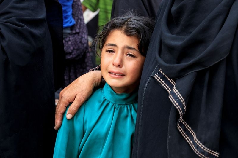 Image for Israeli tanks kill 59 people in Gaza crowd trying to get food aid, medics say