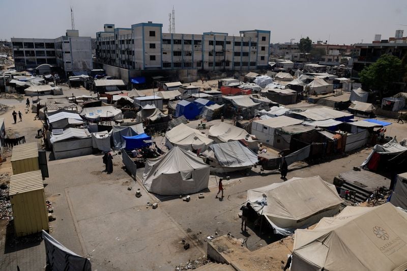 Image for Israeli military warns Gaza City residents to leave, bombs high-rise tower