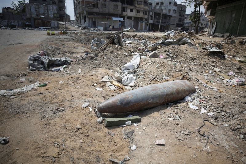Image for Clearing Gaza's surface of bombs will take up to 30 years, aid group says
