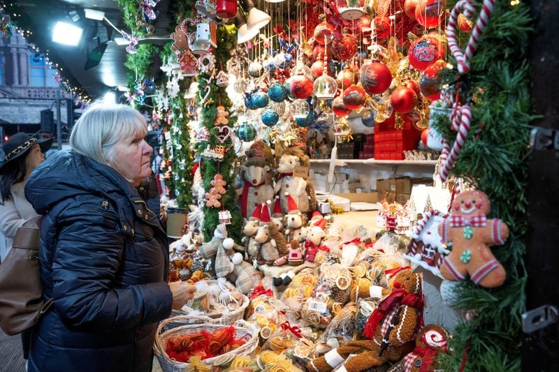 Image for Britons splurge on food, cut back on gifts as retailers warn of tough 2026