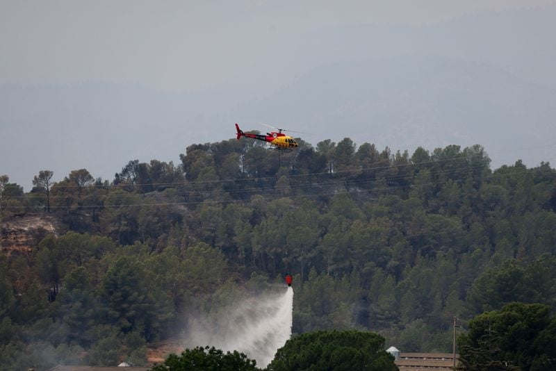 Image for More than 18,000 people in lockdown as wildfire rages in Catalonia