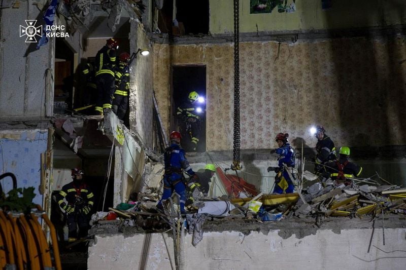 Image for Ukrainians mourn 31 killed in Russian strike on Kyiv