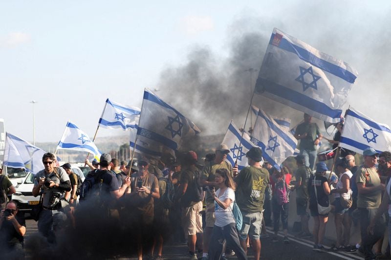 Image for Israelis stage nationwide protests to demand end to Gaza war and release of hostages