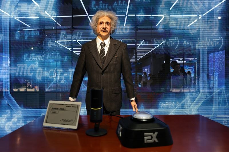 Image for Beijing robot store stocks Einstein replicas, chess partners, in AI leadership push