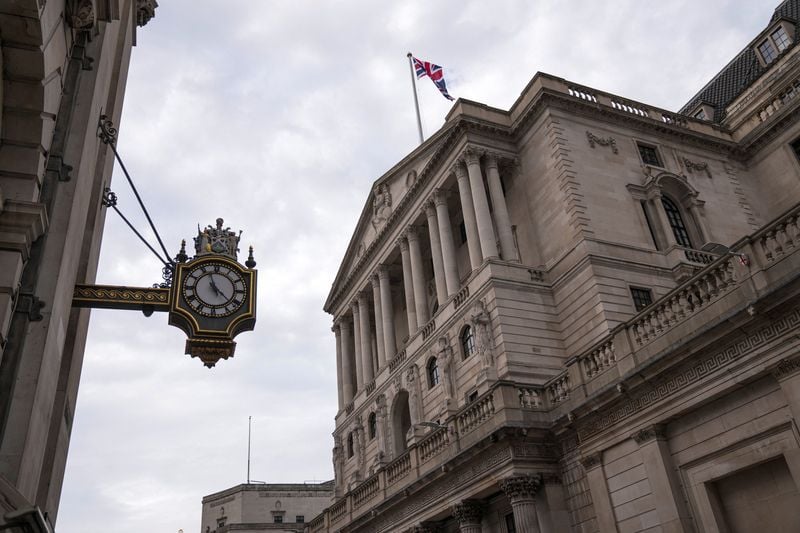 Image for Bank of England leaves rates steady after tight vote, sterling falls