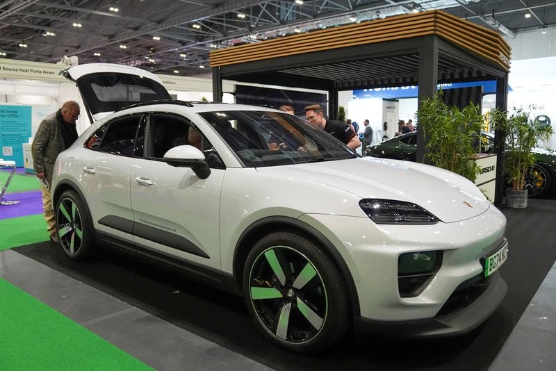 Image for Porsche trims outlook in 'storm' of US tariff woes and China slump