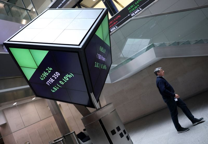 Image for FTSE 100 retreats after record high; Tesco gains