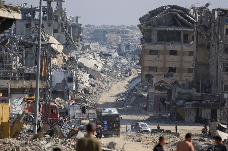 Image for Hamas hands over three more hostage bodies