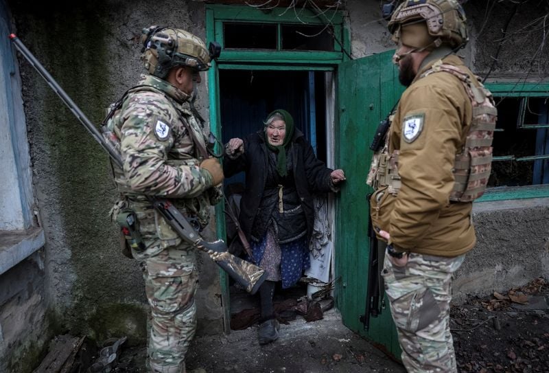Image for As Russians get closer, some Ukrainians refuse to leave