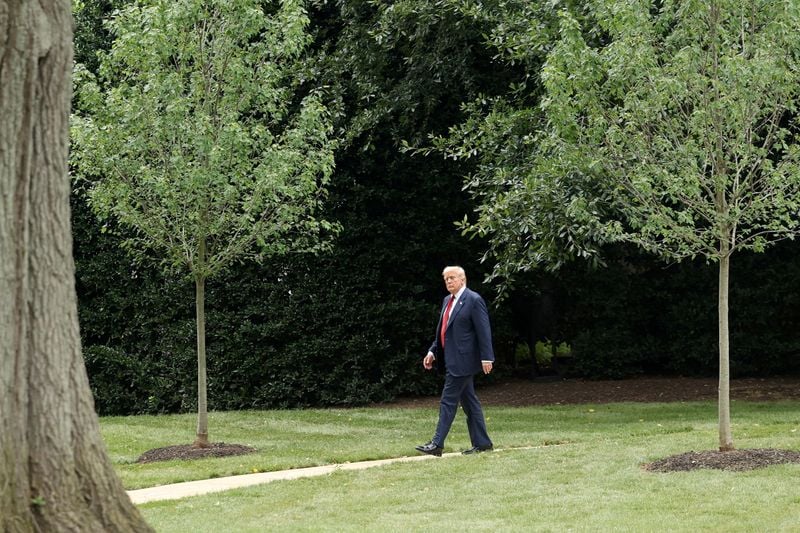 Image for After diplomatic blitz on Ukraine and Gaza, Trump moves to passenger seat