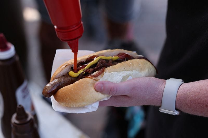 Image for Australians sizzle on election day with 'democracy sausage' and 'budgy smugglers'