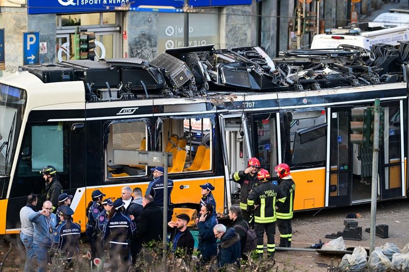 Image for Tram derails in central Milan leaving two dead, 40 injured