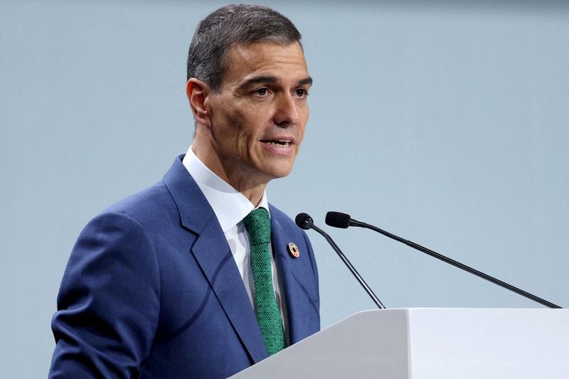 Image for Spanish PM's Socialist party slips in poll as graft scandal takes toll