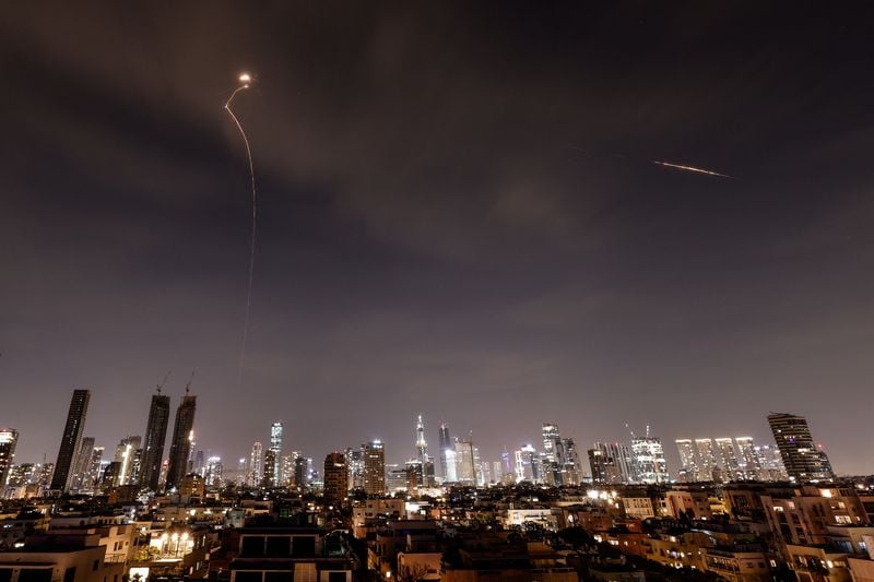 Image for Iran sends waves of missiles into Israel, dismisses Trump's talk of negotiations as 'fake news'